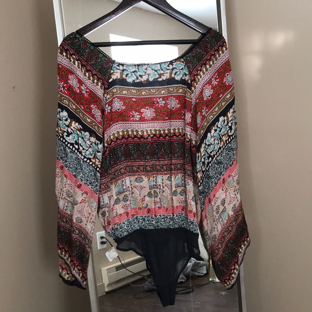 Free people body suit, open back with ties